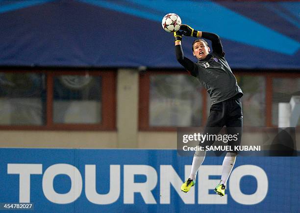 Austria Wien football team's goalkeeper Heinz Lindner jumps to catch the ball during a training session at Erns Happel stadium in Vienna on December...