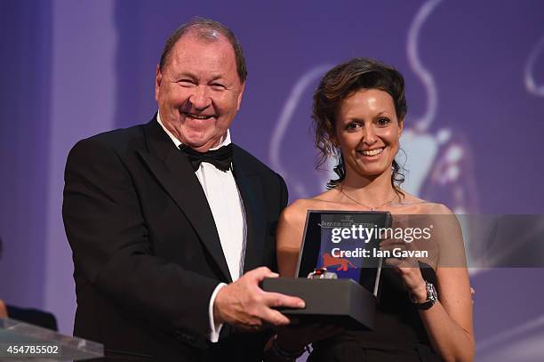 Director Roy Andersson poses after receiving the Golden Lion Award for Best Film for 'A Pigeon Sat On A Branch Reflecting On Existence' with a...