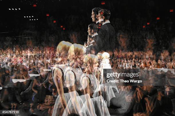 Models walk the runway during Carmen Marc Valvo show at Mercedes-Benz Fashion Week Fall 2014 on September 5, 2014 in New York City.