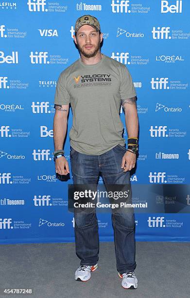 Actor Tom Hardy of "The Drop" poses at "The Drop" Press Conference during the 2014 Toronto International Film Festival at TIFF Bell Lightbox on...