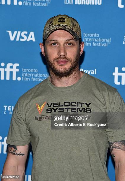 Actor Tom Hardy of "The Drop" poses at "The Drop" Press Conference during the 2014 Toronto International Film Festival at TIFF Bell Lightbox on...
