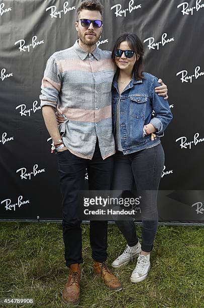 In this handout image supplied by Ray-Ban, Rick Edwards and Emer Kenny attend The Ray-Ban Rooms at Bestival poses during the 2nd day of Bestival 2014...
