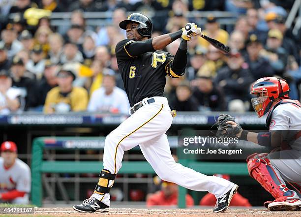 Starling Marte of the Pittsburgh Pirates bats during Game Four of the National League Division Series against the St. Louis Cardinals on Monday,...