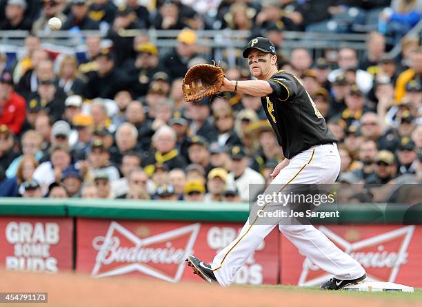 Justin Morneau of the Pittsburgh Pirates stands ready at first base during Game Four of the National League Division Series against the St. Louis...