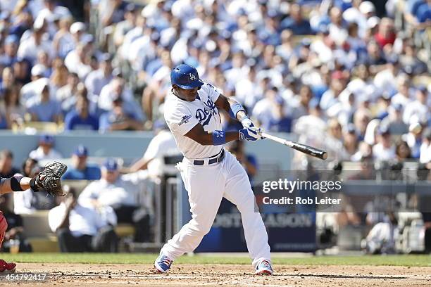 Yasiel Puig of the Los Angeles Dodgers singles during Game Five of the National League Championship Series against the St. Louis Cardinals on October...