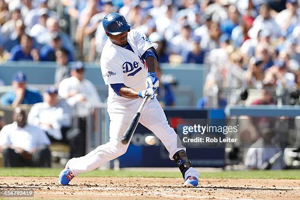 Juan Uribe of the Los Angeles Dodgers bats during Game Five of the National League Championship Series against the St. Louis Cardinals on October 16,...