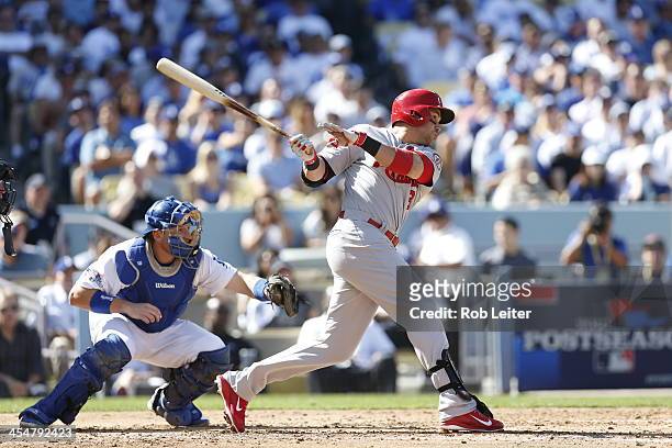 Carlos Beltran of the St. Louis Cardinals bats during Game Five of the National League Championship Series against the Los Angeles Dodgers on October...