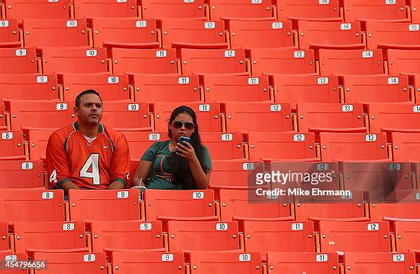 Miami Hurricanes fans watcht during a game against the Florida A&M Rattlers at Sunlife Stadium on September 6, 2014 in Miami, Florida.