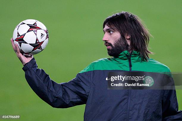 Giorgios Samaras of Celtic FC holds the ball during a training session ahead their UEFA Champions League Group H match between FC Barcelona and...