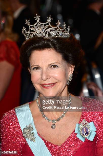 Queen Silvia of Sweden attends the Nobel Prize Banquet after the 2013 Nobel Prize Awards Ceremony at City Hall on December 10, 2013 in Stockholm,...