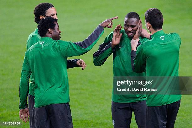 Amido Balde of Celtic FC jokes with his teammates during a training session ahead their UEFA Champions League Group H match between FC Barcelona and...