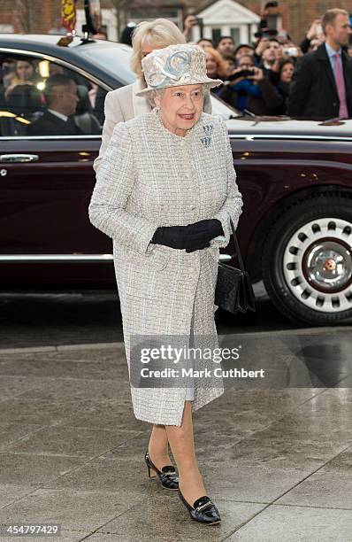 Queen Elizabeth II visits the new Barnardo's HQ in Barkingside on December 10, 2013 in London, England.