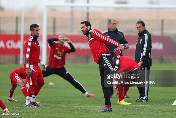 Mohamed Aboutreika of Al Ahly Sport Club stretches during a training session at the Agadir Stadium on December 10, 2013 in Agadir, Morocco.