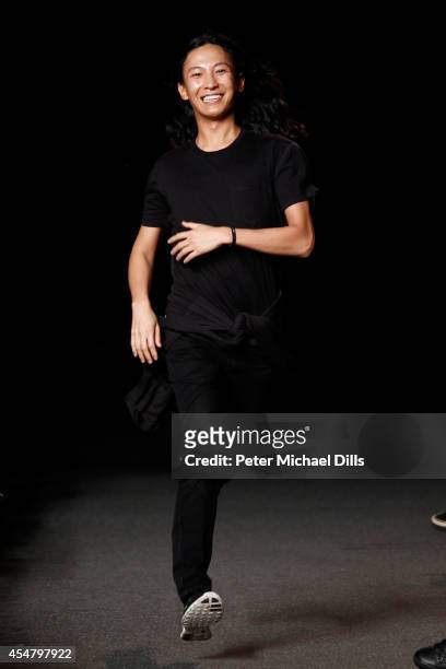 Designer Alexander Wang appears on the runway at the Alexander Wang fashion show during Mercedes-Benz Fashion Week Spring 2015 at Pier 94 on...
