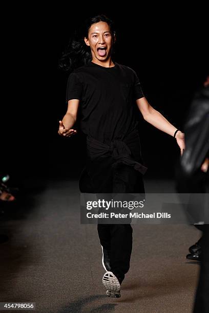 Designer Alexander Wang appears on the runway at the Alexander Wang fashion show during Mercedes-Benz Fashion Week Spring 2015 at Pier 94 on...