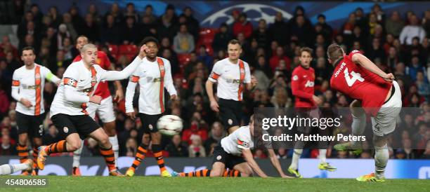 Phil Jones of Manchester United scores their first goal during the UEFA Champions League Group A match between Manchester United and Shakhtar Donetsk...