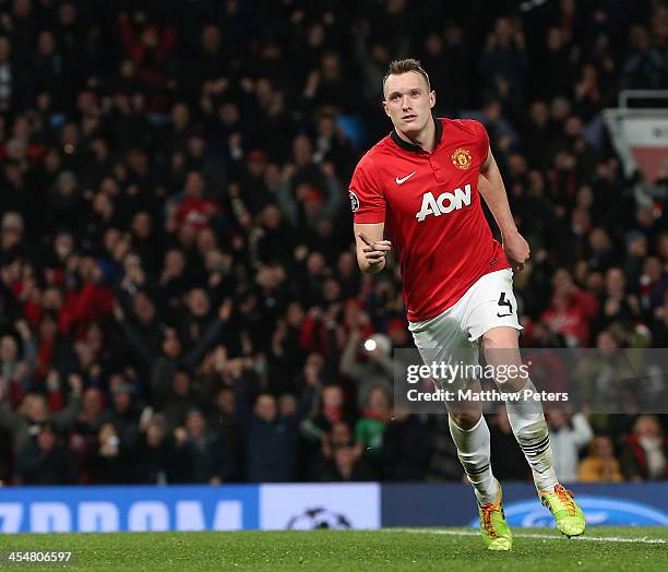 Phil Jones of Manchester United celebrates scoring their first goal during the UEFA Champions League Group A match between Manchester United and...