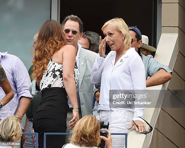 Martina Navratilova and Julia Lemigova celebrate their engagement during day 13 of the 2014 US Open at USTA Billie Jean King National Tennis Center...