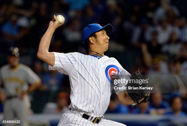 Relief pitcher Kyuji Fujikawa of the Chicago Cubs delivers a pitch during the eighth inning against the Pittsburgh Pirates at Wrigley Field on...