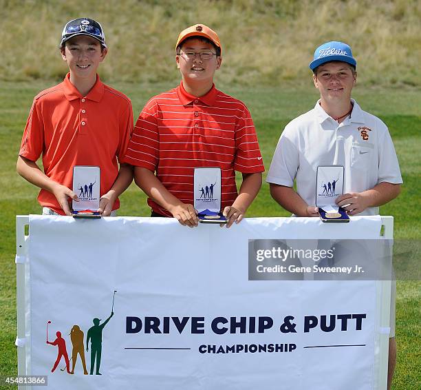 Winners in the boys 14-15 putt category second place Nate Stember, first place Samuel Pyon and third place Ashton Robb at the Drive Chip and Putt...