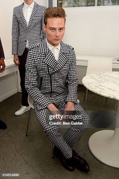 Model poses backstage at the Sherman Preston Presentation during Mercedes-Benz Fashion Week Spring 2015 at the Curator Gallery on September 6, 2014...
