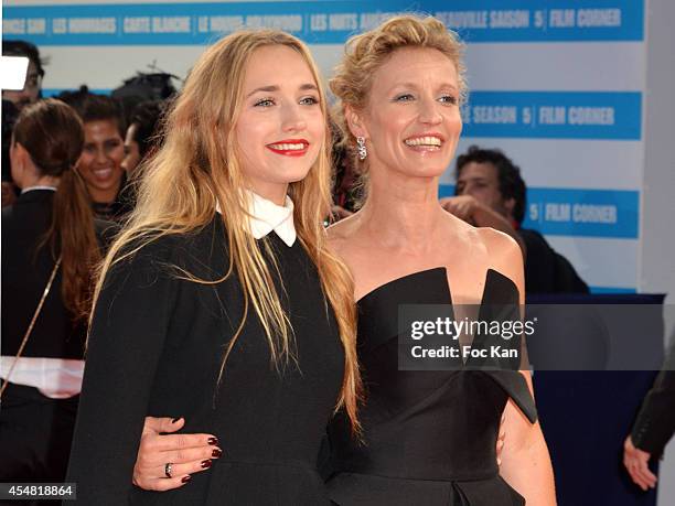 Chloe Jouannet and Alexandra Lamy arrive at "The Hundred Foot Journey" premiere at the 40th Deauville American Film Festival at the CID on September...