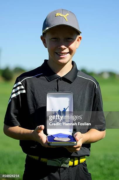 Regional Finals Boys 10-11 overall champion Ryan Blair poses for a portrait with his medal at the Drive, Chip and Putt competition on September 6,...