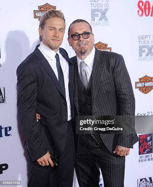 Actor Charlie Hunnam and executive producer Kurt Sutter arrive at FX's "Sons Of Anarchy" premiere at TCL Chinese Theatre on September 6, 2014 in...
