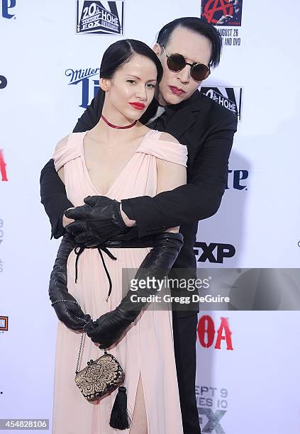 Singer Marilyn Manson and Lindsay Usich arrive at FX's "Sons Of Anarchy" premiere at TCL Chinese Theatre on September 6, 2014 in Hollywood,...