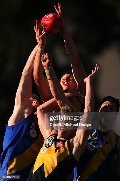 Daniel Currie of Werribee marks the ball during the VFL Semi Final match between Williamstown and Werribee at North Port Oval on September 7, 2014 in...