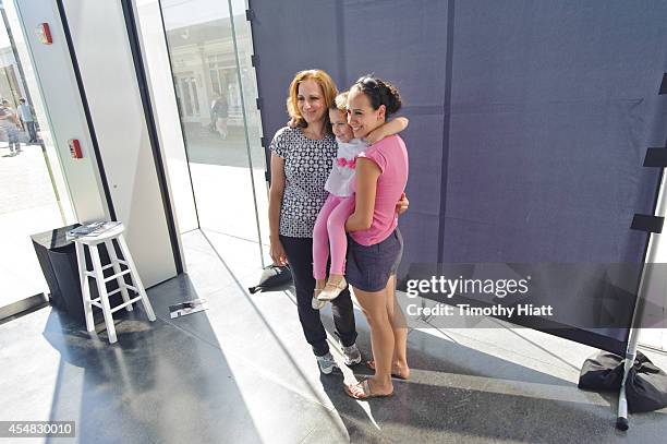 Chicagoans attend the White House Black Market Pop-Up Studio at Old Orchard Mall on September 6, 2014 in Skokie, Illinois.