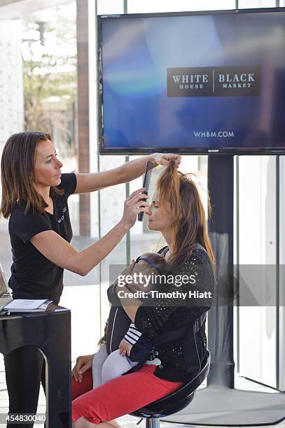 Chicagoans attend the White House Black Market Pop-Up Studio at Old Orchard Mall on September 6, 2014 in Skokie, Illinois.