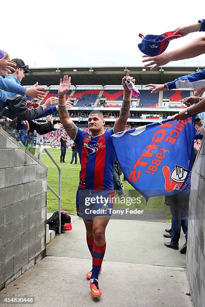 Willie Mason waves to fans after his last game for the Knights during the round 26 NRL match between the Newcastle Knights and the St George...