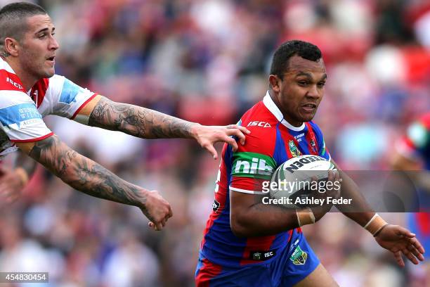 Travis Waddell of the Knights in action during the round 26 NRL match between the Newcastle Knights and the St George Illawarra Dragons at Hunter...