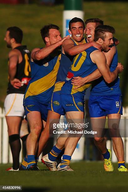 Williamstown players celebrate a goal during the VFL Semi Final match between Williamstown and Werribee at North Port Oval on September 7, 2014 in...