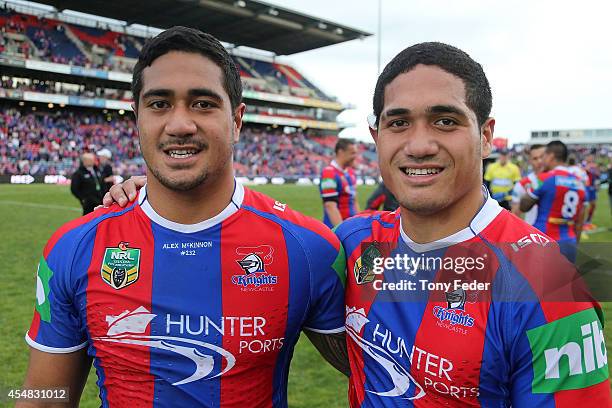 Chanel Mata'Utia and brother Sione Mata'Utia of the Knights during the round 26 NRL match between the Newcastle Knights and the St George Illawarra...