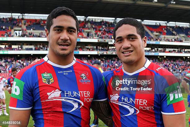 Chanel Mata'Utia and brother Sione Mata'Utia of the Knights during the round 26 NRL match between the Newcastle Knights and the St George Illawarra...