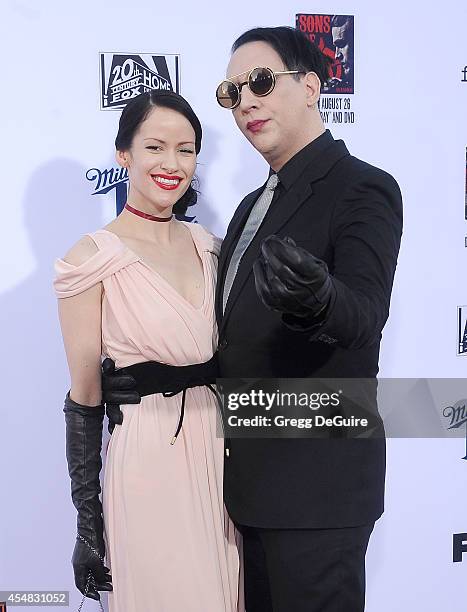 Singer Marilyn Manson and Lindsay Usich arrive at FX's "Sons Of Anarchy" premiere at TCL Chinese Theatre on September 6, 2014 in Hollywood,...