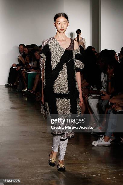 Model walks the runway wearing Ammar Belal's collections at Parsons MFA runway show during MADE Fashion Week Spring 2015 at Milk Studios on September...
