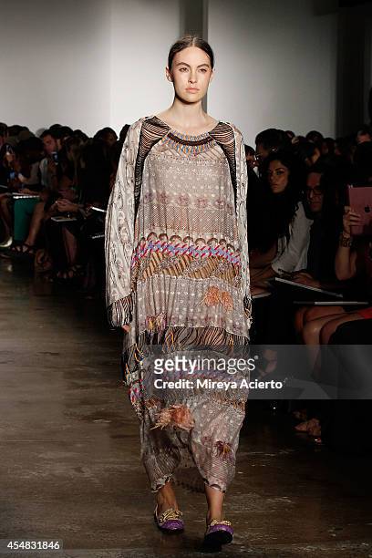 Model walks the runway wearing Ammar Belal's collections at Parsons MFA runway show during MADE Fashion Week Spring 2015 at Milk Studios on September...