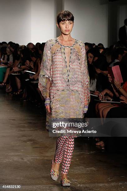 Model walks the runway wearing Ammar Belal's collections at Parsons MFA runway show during MADE Fashion Week Spring 2015 at Milk Studios on September...