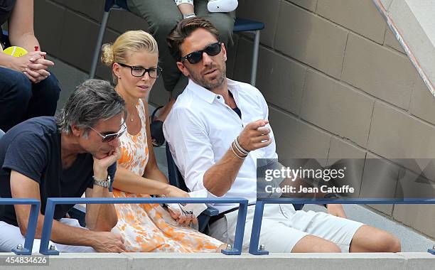 Henrik Lundqvist and his wife Therese Andersson attend the men's semi finals during Day 13 of the 2014 US Open at USTA Billie Jean King National...