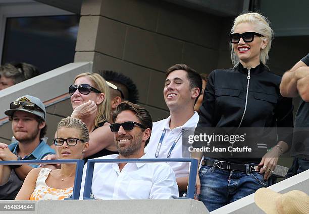 Chris Evert, Henrik Lundqvist and his wife Therese Andersson, Gwen Stefani attend the men's semi finals during Day 13 of the 2014 US Open at USTA...