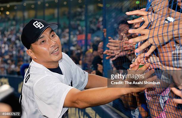 Starting pitcher Masahiro Yamamoto of Chunichi Dragons celebrates the win with fans after the Central League game against Hanshin Tigers at Nagoya...