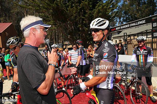 Founder and Chairman of Best Buddies International Anthony Shriver is interviewed at the finish line of the Best Buddies Challenge Hearst Castle at...