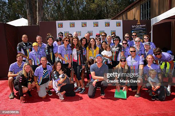 Team SVB poses at the finish line of the Best Buddies Challenge Hearst Castle at Hearst Ranch on September 6, 2014 in San Simeon, California.