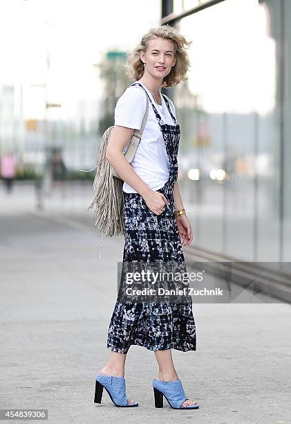 Blogger Zanita Whittington is seen outside the Tibi show wearing a Tibi Jumpsuit, Tibi shoes and a Barbara Bonner backpack on September 6, 2014 in...