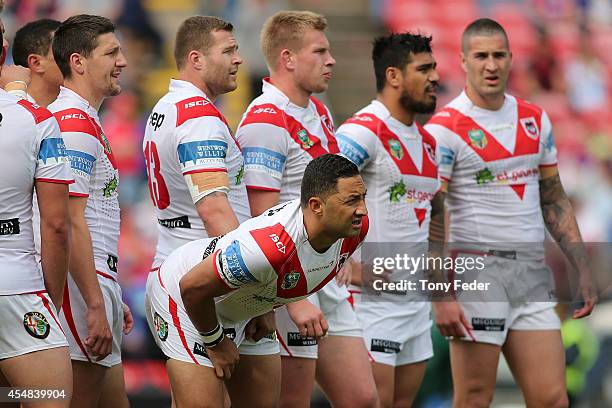 Benji Marshall of the Dragons looks on with teammates during the round 26 NRL match between the Newcastle Knights and the St George Illawarra Dragons...