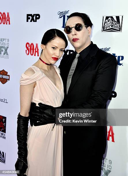 Actor/singer Marilyn Manson and Lindsay Usich arrive at the season 7 premiere screening of FX's "Sons of Anarchy" at the Chinese Theatre on September...