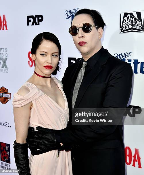 Actor/singer Marilyn Manson and Lindsay Usich arrive at the season 7 premiere screening of FX's "Sons of Anarchy" at the Chinese Theatre on September...